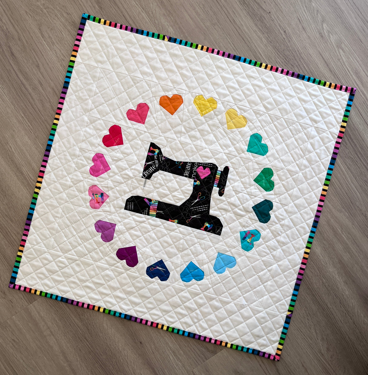 Just Sew Mini quilt paper pieced pattern sewn in rianbow fabric
