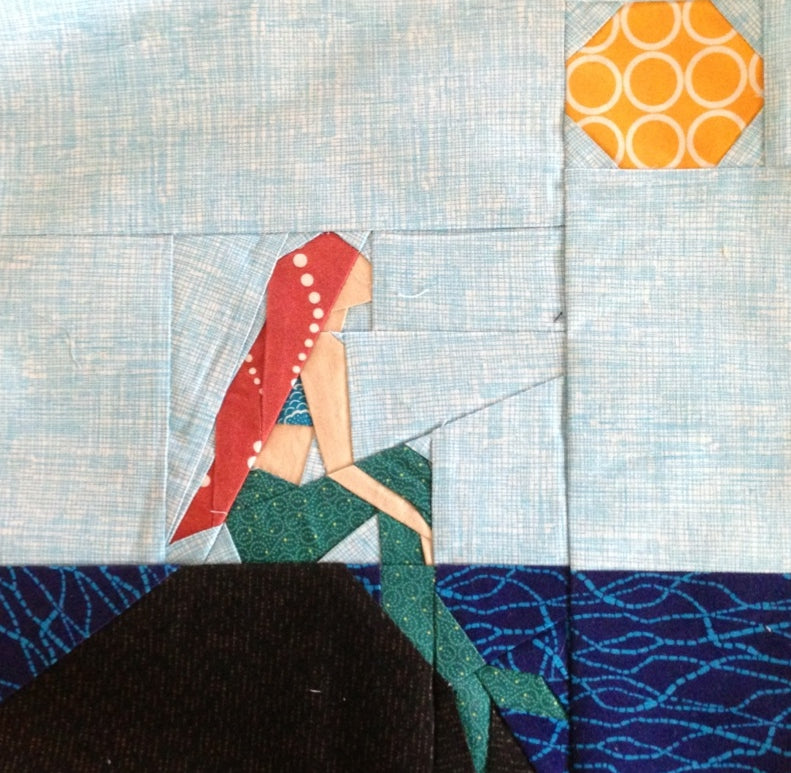 mermaid foundation paper pieced pattern in fabric with fussycut details