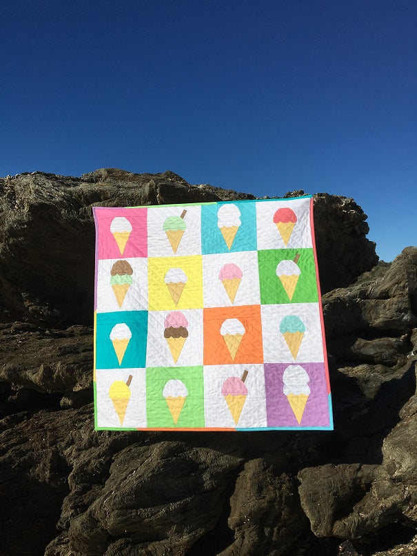 ice cream paper pieced patterns featuring bright colours made into a cute baby quilt