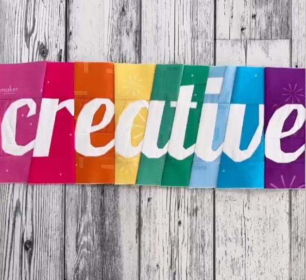 creative in script paper pieced pattern sewn in rainbow fabric