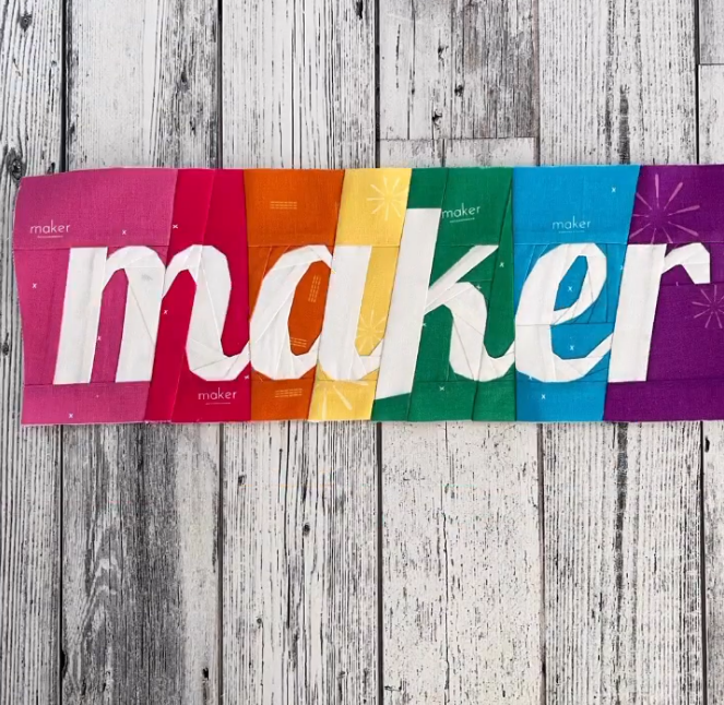 maker in script paper pieced pattern sewn in rainbow fabric